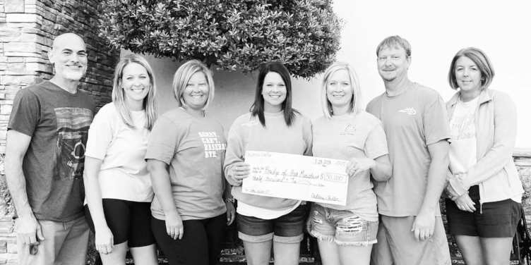 Bridge of Hope Ministries accepted a $30,000 donation from the Children’s Shelter of Walnut Ridge.